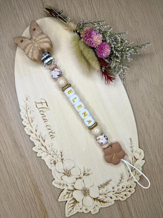 Attache tétine papillon camel