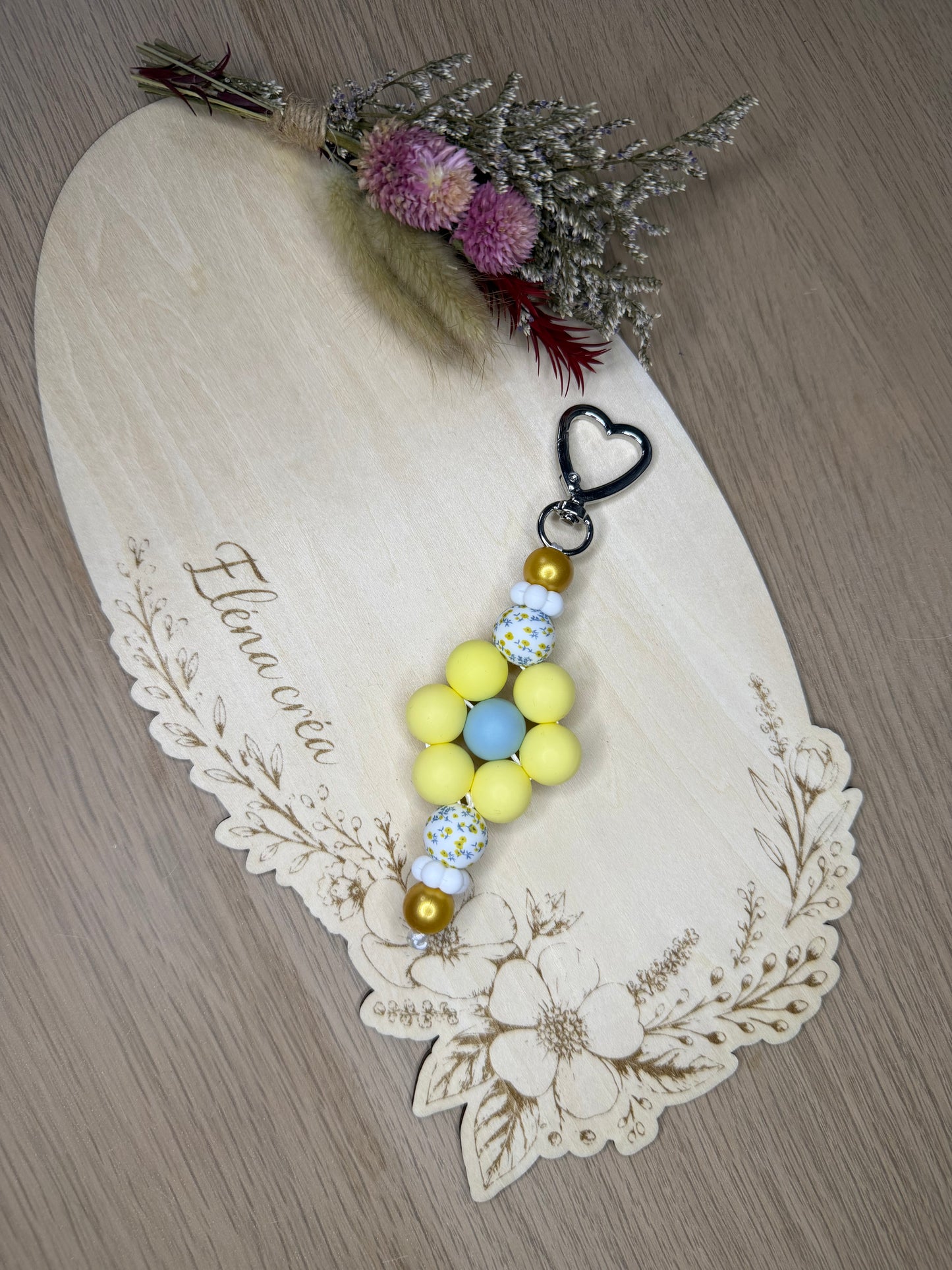 Porte clé fleur jaune pastel