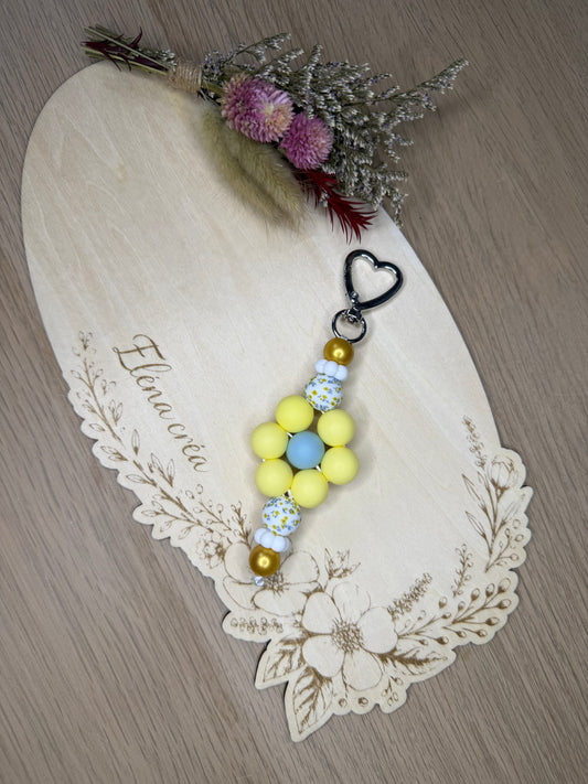 Porte clé fleur jaune pastel